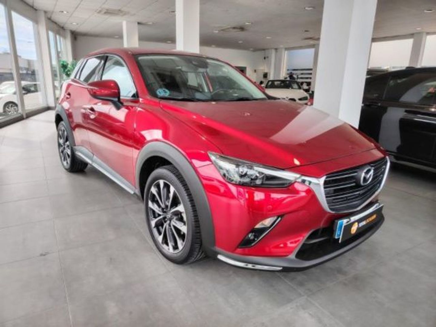 Mazda CX-3 2.0 G Zenith 2WD 89 kW (121 CV) Rojo All Terrain / Pick-up