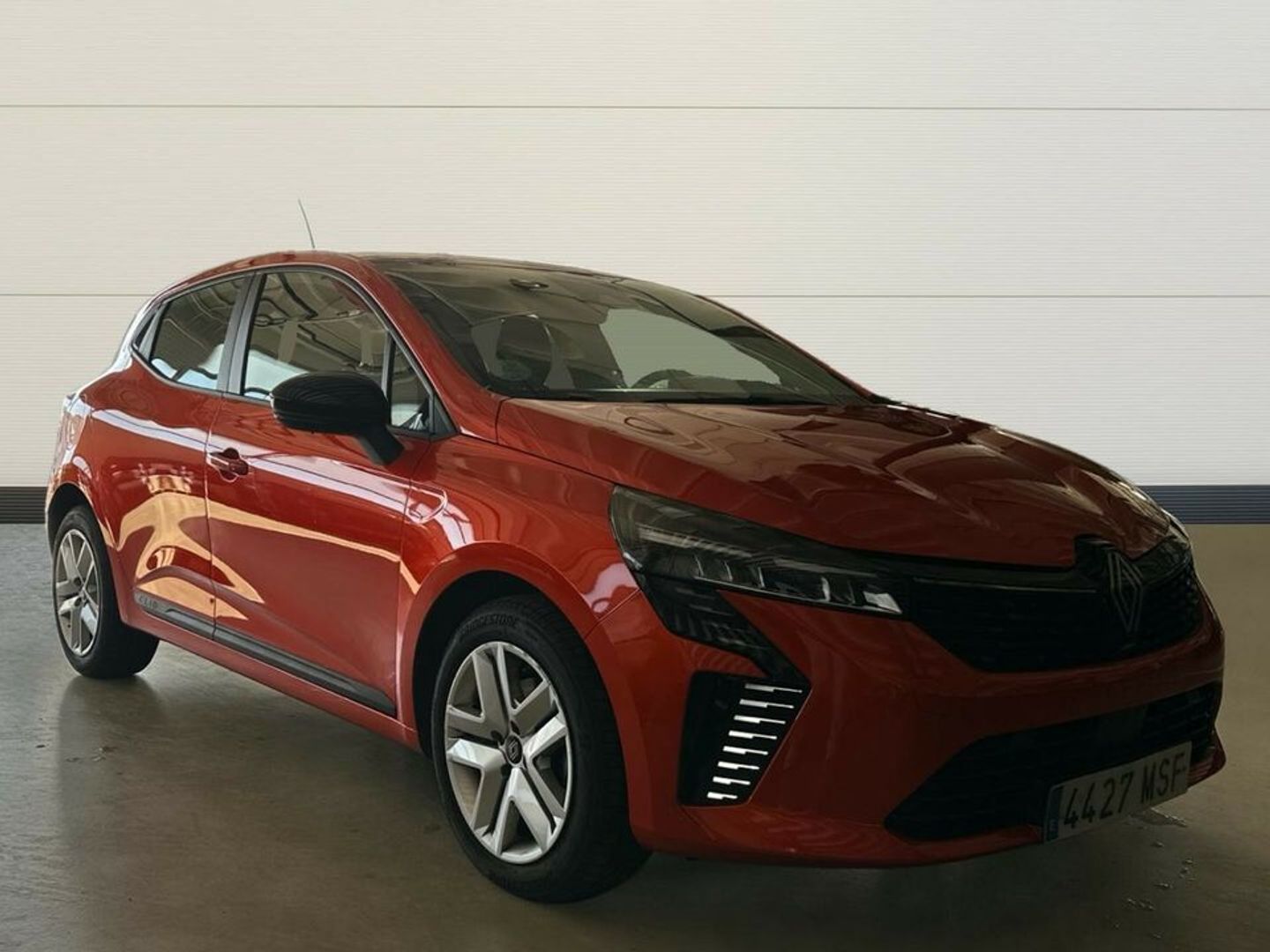 Renault Clio Evolution dCi 74 kW (100 CV) Naranja Sedan